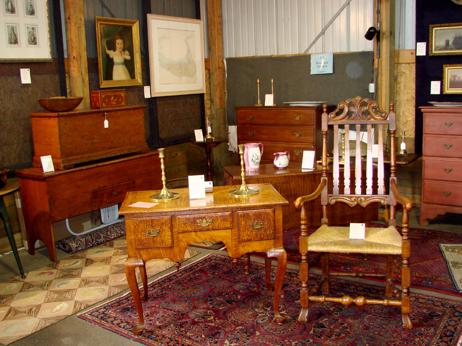Chris and Karen Doscher, Witt’s End Antiques, Wallkill, N.Y., had a booth full of early furniture, brass candlesticks and paintings.