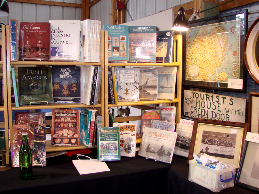 An assortment of reference books was available in the booth of David Thompson Antiques, South Dennis, Mass. Thompson also had sets of ABC blocks, decoys, signs and paintings.