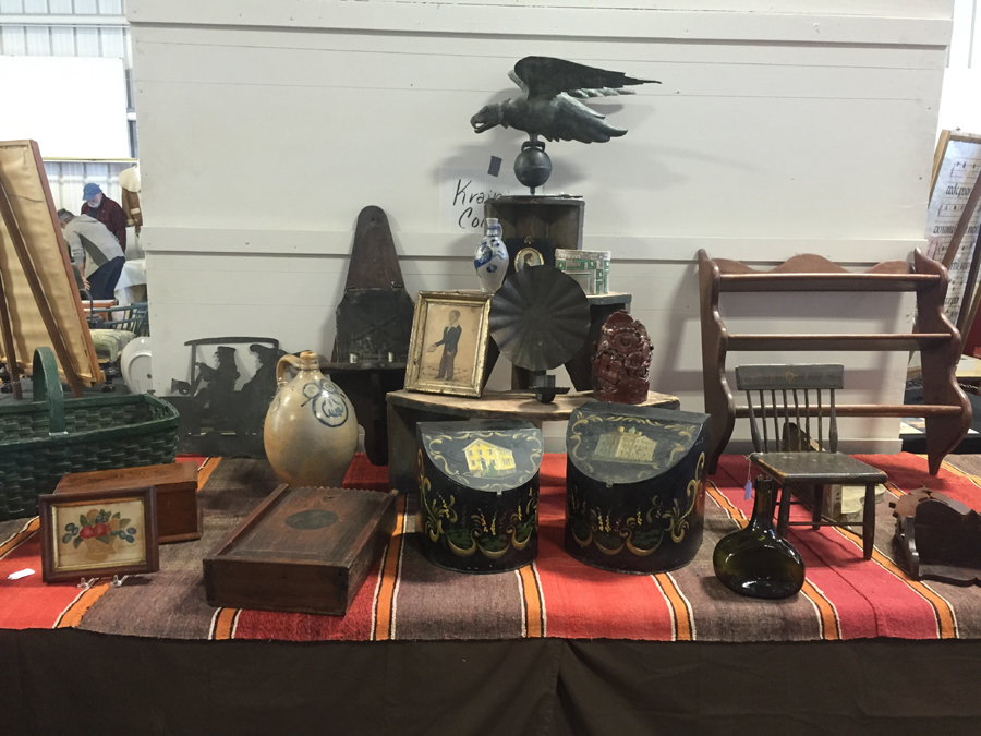Bettina Krainin and Harold Cole, Woodbury, Conn., brought with them a Jewell eagle weathervane, circa 1860s, and in the smallest size the maker made, along with a whimsical Ohio sewer tile pottery piece and a Nineteenth Century Federal tea tin from Boston.