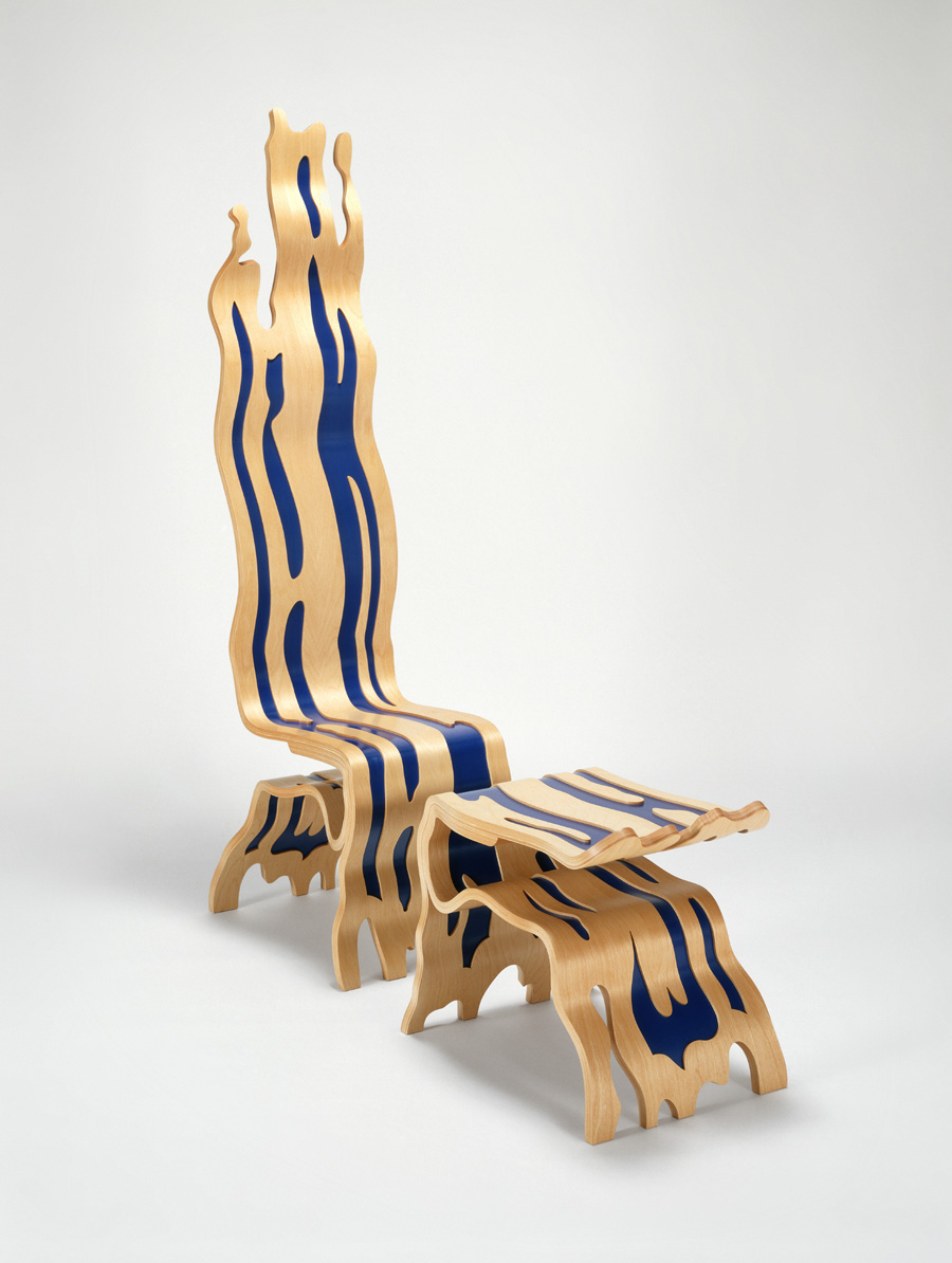 “Brushstroke Chair, Wood” and “Brushstroke Ottoman, Wood” by Roy Lichtenstein 1986–88, white birch, veneer, enamel, oil, and varnish, 70<sup>11</sup>/<sub>16</sub> by 18 by 27¼ inches (chair), 20¾ by 17¾ by 24 inches (ottoman). Collaboration: Donald Saff, Ken Elliot, Patrick Foy, Susie Hennessy, and Beeken/Parsons Company.