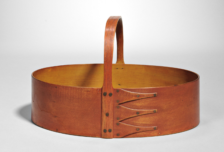 Oval fixed-handle carrier, Canterbury, N.H., circa 1860, $ 14,760 ($ 30/50,000). Inscribed in black ink “Ednah E. Fitts, Chh. Canterbury 1860.” Sister Ednah E. Fitts served as a trustee and as a nurse at Canterbury from 1911 to 1918.<br>Exhibited at the Whitney Museum in 1986. Collection of Erhart Muller.