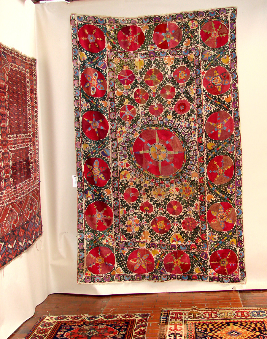 Alberto Levi, Milan, Italy, had a central Asian Suzani, storage bags and a fragment of a Sixteenth Century Kilim.