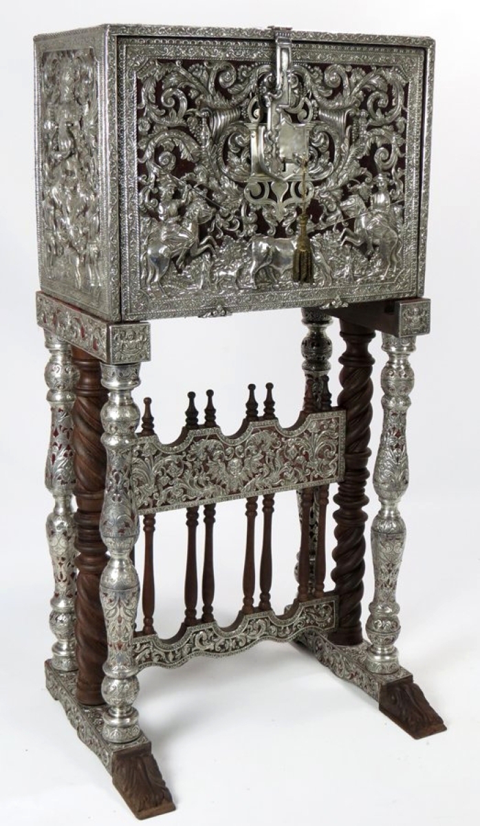 From an extensive single-owner collection of Spanish colonial silver and artwork, this exceptional silver clad, fall front desk achieved $22,800. The silver depicted hunting scenes and the interior drawers were inlaid with bone. It was made in Bolivia, circa 1750–60 and reached $22,800.