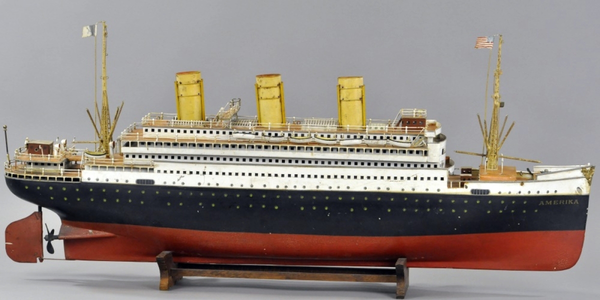 Sailing away with the top lot of the auction on Saturday was the Marklin steam-powered Amerika, Germany, circa 1920–30, red and black hull, masts with outriggers and rope ladders, flying bridge, three funnels with steam power, rows of lifeboats at sides of railed upper deck and finely detailed overall. It sold for $59,000, exceeding the $45,000 high estimate. The liner came from the grandchildren of the original New England man who received it as a child.