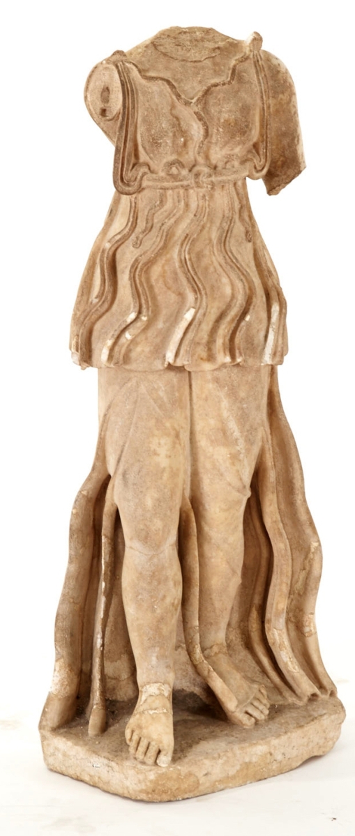 An Italian baroque carved marble statue ($1/1,500), Eighteenth Century or earlier, of a classically draped maiden took $33,600, 34 by 11 by 8 inches, Ford Foundation collection.