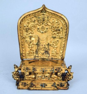 One of the unexpected top lots in the sale was this Nepalese Thirteenth Century gilt bronze throne for an image. Two human figures flanked a lion throne and its final price was $23,400.