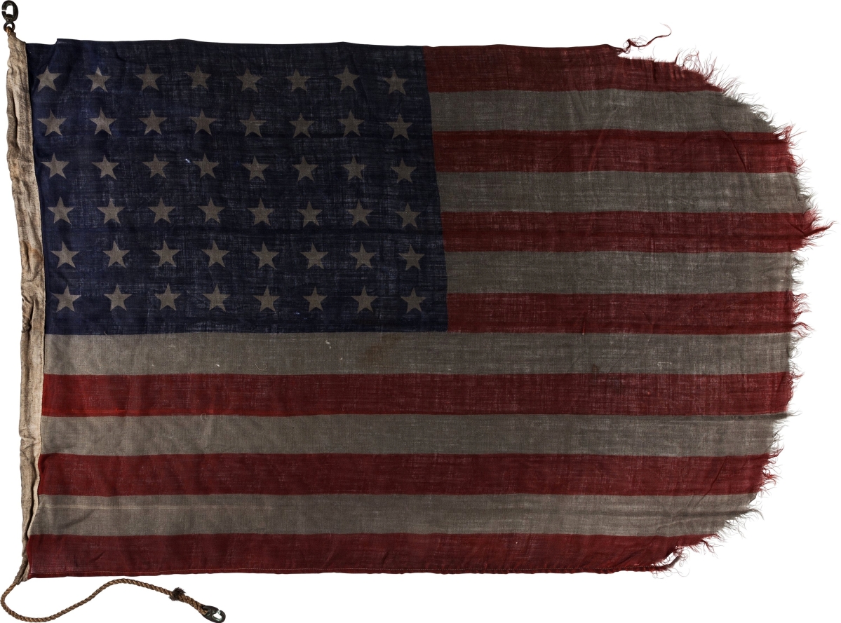 An Omaha Beach D-Day flag that was flown on a LCT Landing Craft with 48 stars and frayed edges, realized $45,000.