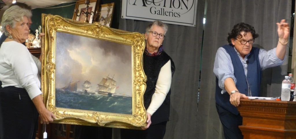 On day two, one of the popular nautical paintings was this “English Man-of-War Forming Up in the Straits of Dover” by Thomas Buttersworth (English, 1768–1842), oil on canvas, faintly signed lower right. It may be in the original ornate gilt frame, measures 24 by 29 inches sight, cleaned and relined and is pictured being knocked down for $32,175 by Kaja Veilleux, auctioneer.