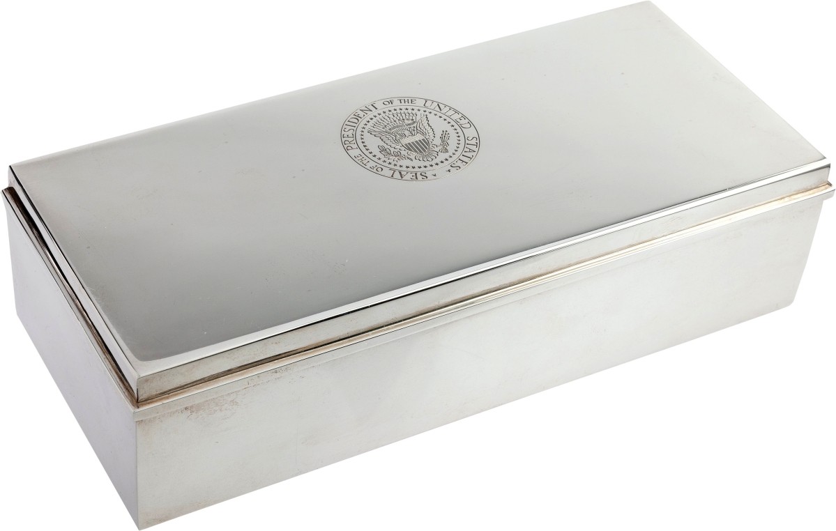 From a collection of presidential memorabilia was a silver cigarette box by Tiffany from the Oval Office during the John F. Kennedy presidency that beat its estimate when it sold at $45,000.