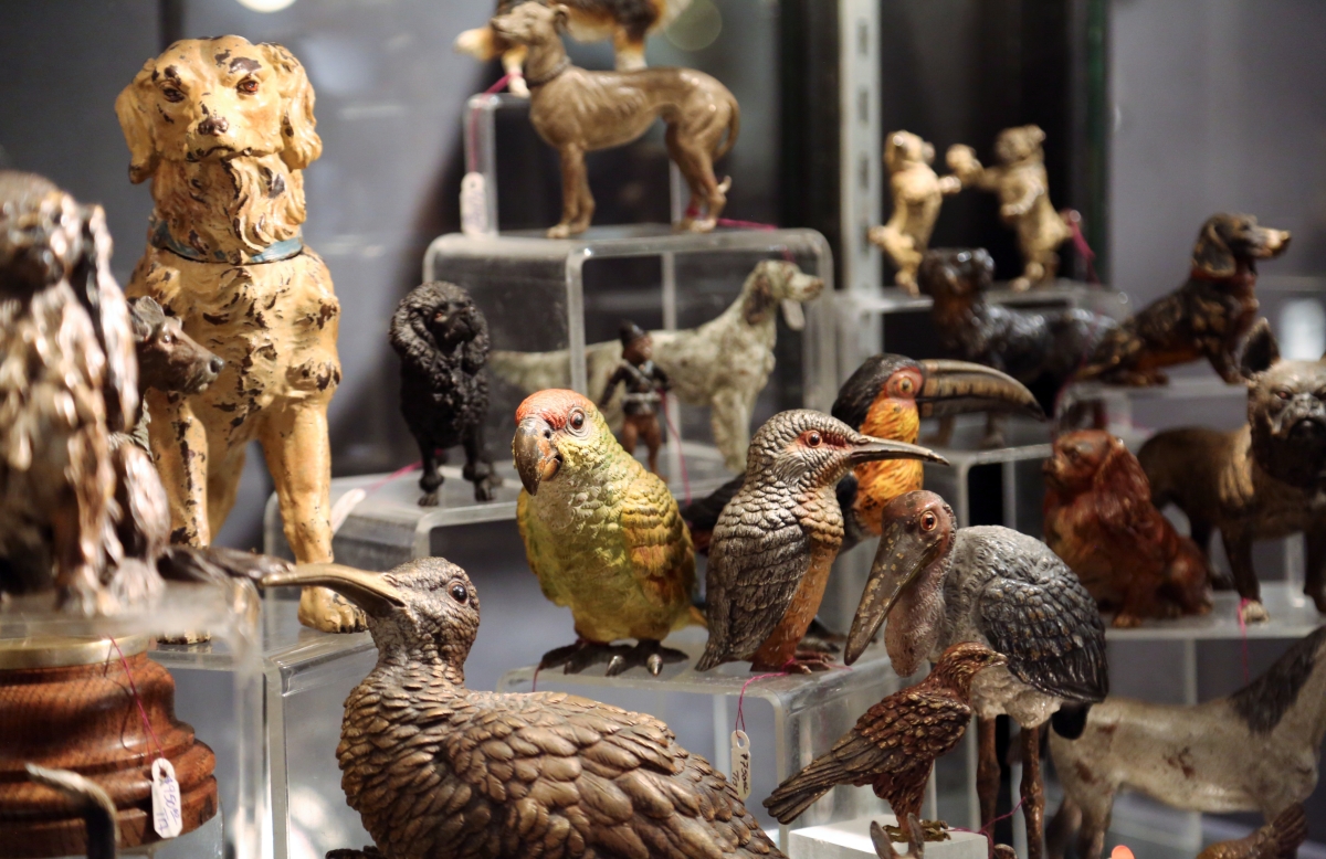 Leatherwood Antiques, Sandwich, Mass., featured its collection of Vienna bronzes. Shown are the more natural works in the form of birds and dogs.