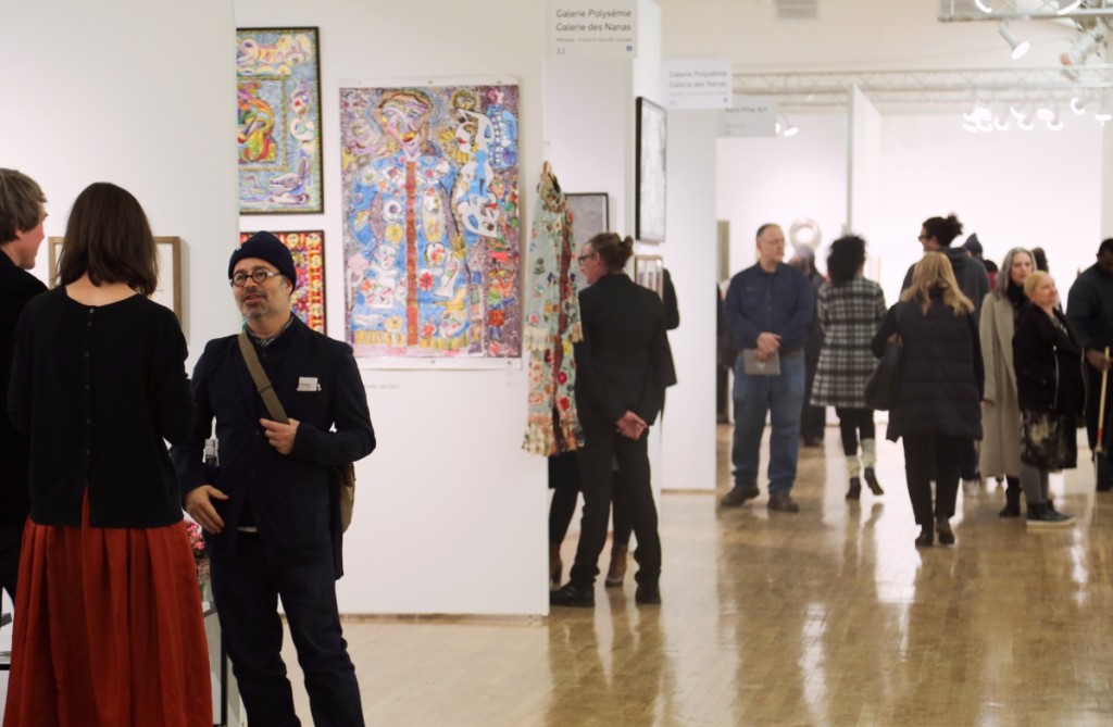 Visitors walked and talked through the booths at the Metropolitan Pavilion.