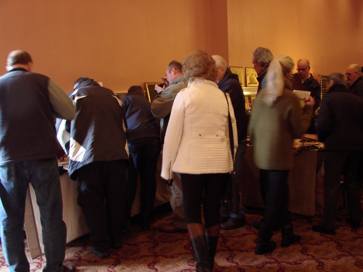 There were at least eight buyers in the booth of Mike and Lucinda Seaward within minutes of the show opening.