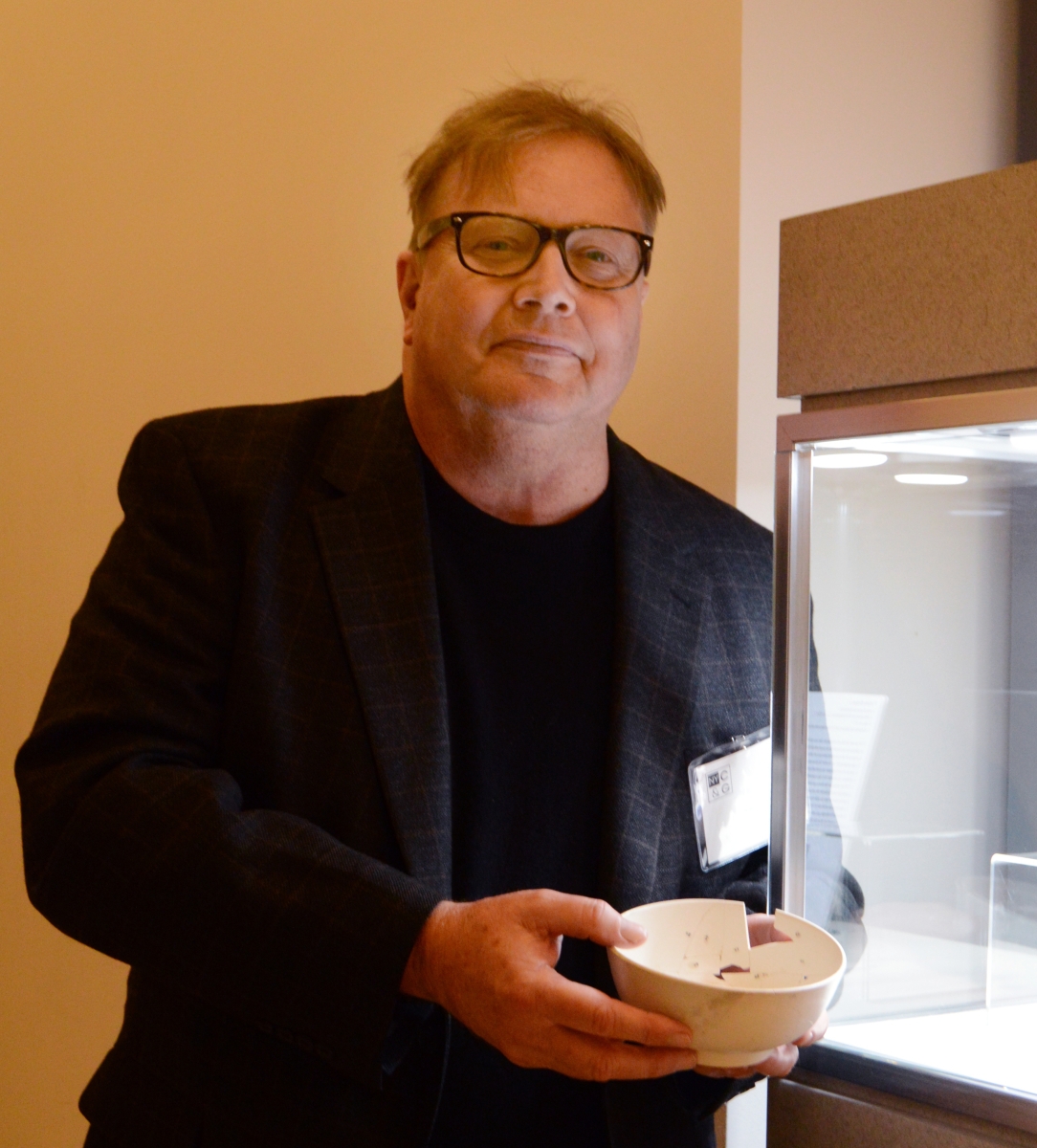 Rob Hunter, editor of the Chipstone Foundation’s annual publication Ceramics in America, displays the Eighteenth Century punch bowl that was excavated in 2014 on the site where the new Museum of the American Revolution was being built. First thought to be stoneware, the bowl was later determined to be hard-paste porcelain, likely made in Philadelphia. The bowl made its public debut here at the show and will return to the museum, which is opening April 19.