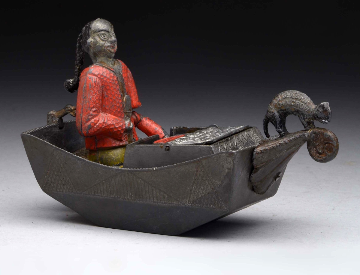 This lead mechanical bank, Chinaman in Boat, 8 inches long, was made by Charles A. Bailey and is in excellent condition. With a high estimate of $45,000, it realized $52,275.