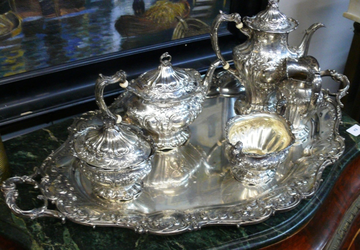 The highest priced lot in the sale was a six-piece silver tea set by Gorham. It weighed 230 troy ounces and finished at $5,040.