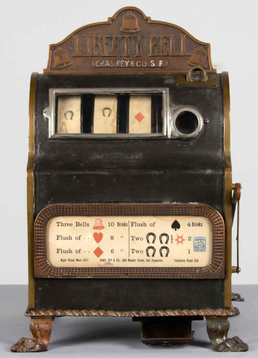 A five-cent Charles Fey Liberty Bell slot machine and shipping crate finished at $174,000.
