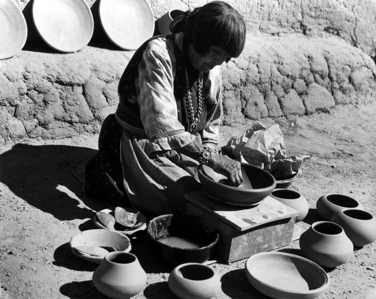 Laura Gilpin, “Maria Martinez Making Pottery,” 1959, gelatin silver print, 10¾ by 14½ inches.