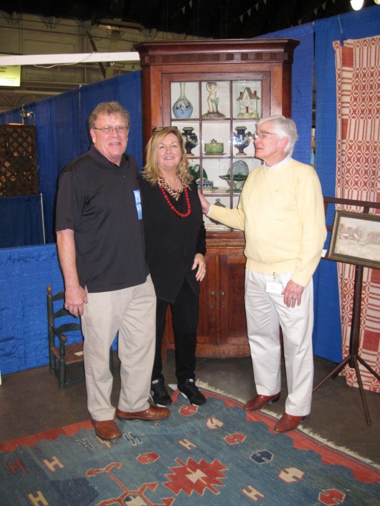 The show’s promoter, Steve Allman and his wife, Judy, were chatting with dealer Steven White about the Bergen County, N.J., corner cupboard he sold during the show, just before it left the show floor.