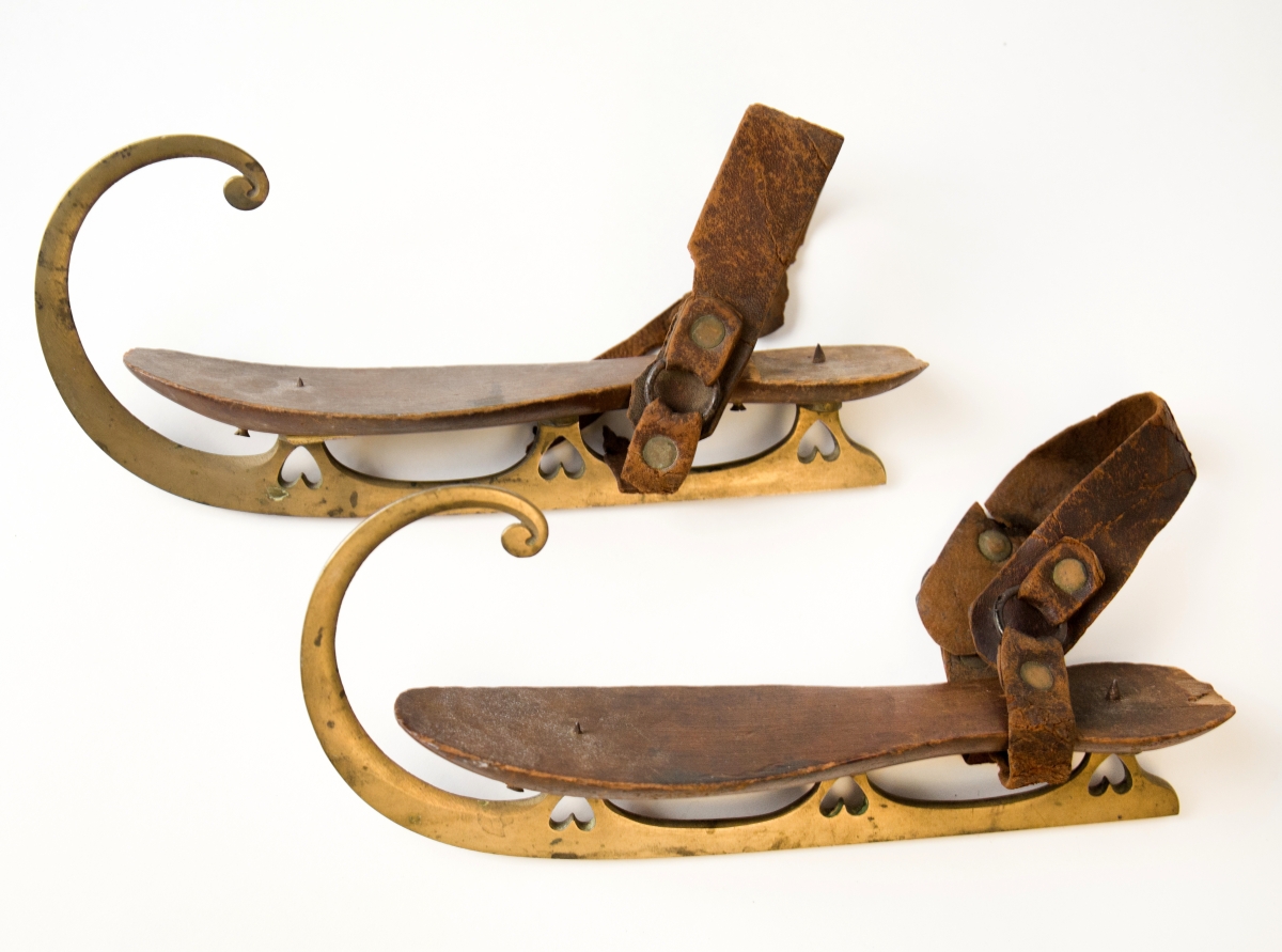 These wood and brass skates in a style popular between the 1850s and the 1870s have heart cutouts on their stanchions.
