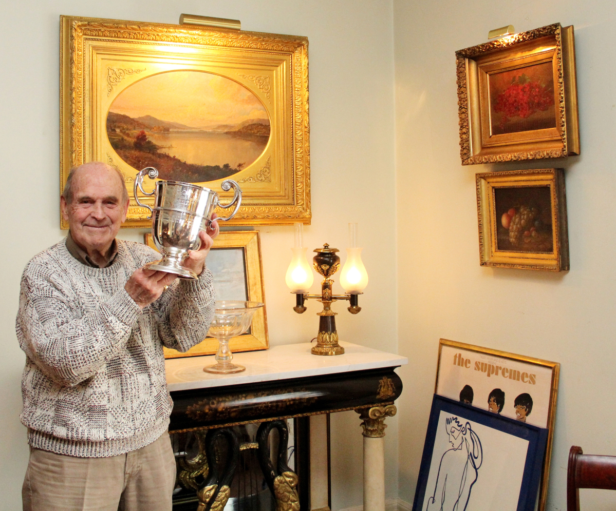Dick Button with his favorite trophy, given to him in 1947 by Ulrich Salchow (1877–1949), perhaps the greatest male skater of the early Twentieth Century. It is not in the Cooperstown show.