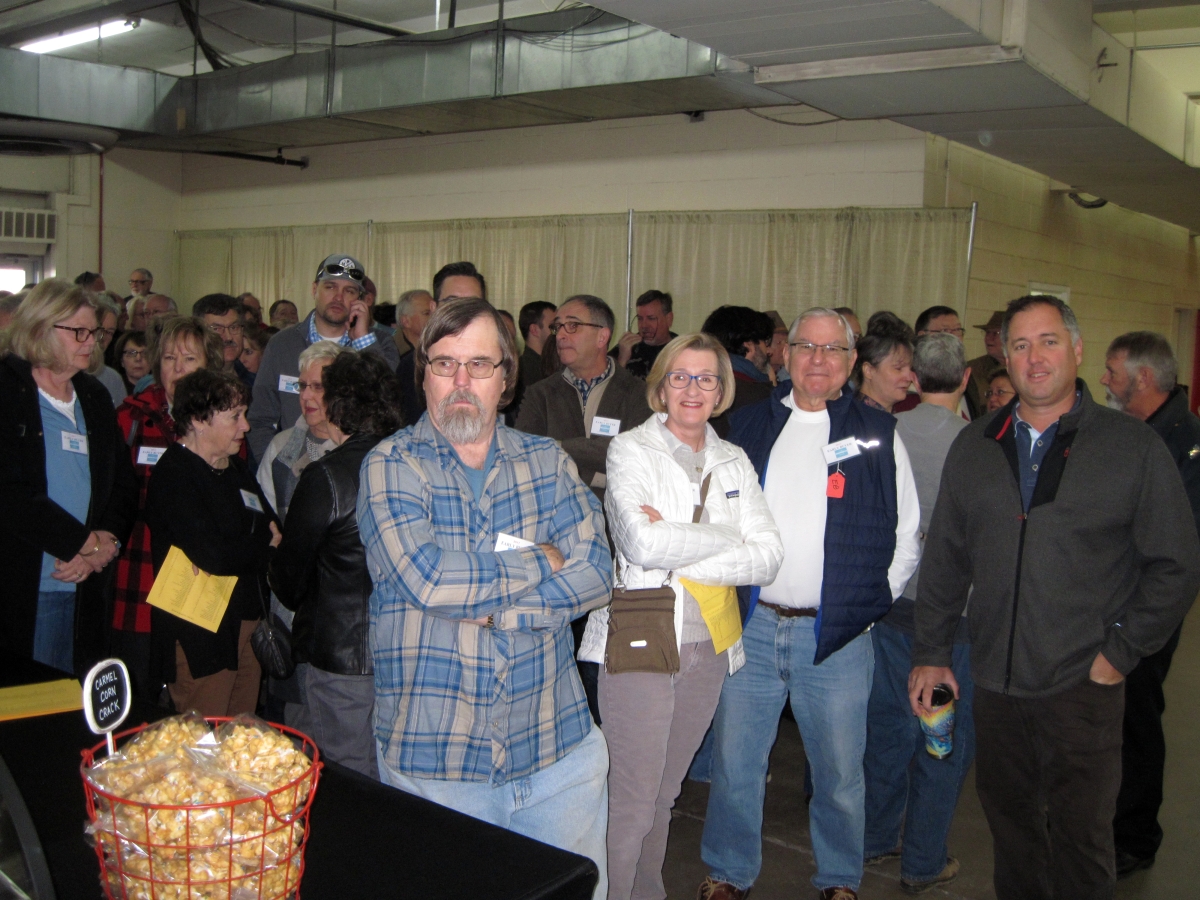 Jon Jenkins, show manager (right) chats with the first arrivals Thursday morning, just moments prior to the 9 am opening.