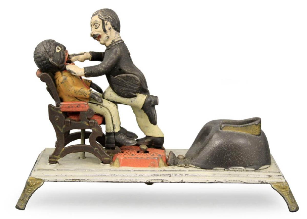 Ray Haradin was on the phone with a client taking bids for the mechanical Dentist bank, and he held out to the end when his party obtained this J&E Stevens piece for $20,400, just over the high estimate. Bidding opened at $11,000, with several people trying to obtain this pristine example that was one time in the collection of Tim Walsh.