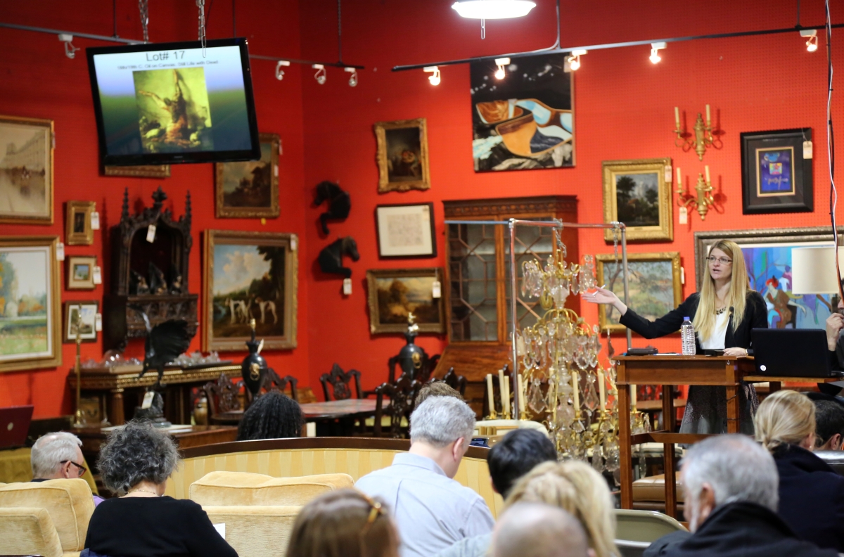 Fine art specialist Nelia Moore called the beginning of the sale.