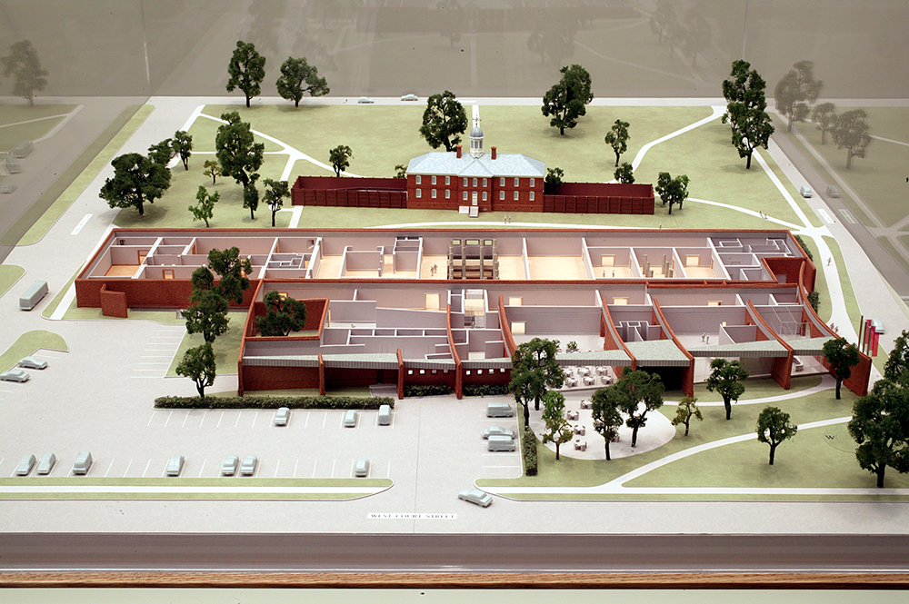A cut-away model of the Art Museums of Colonial Williamsburg’s expansion looking north toward the Public Hospital of 1773. The expansion (shown in foreground) will add more than 60,000 square feet for a 22 percent increase in gallery space as well as a new entrance facing South Francis Street (left).