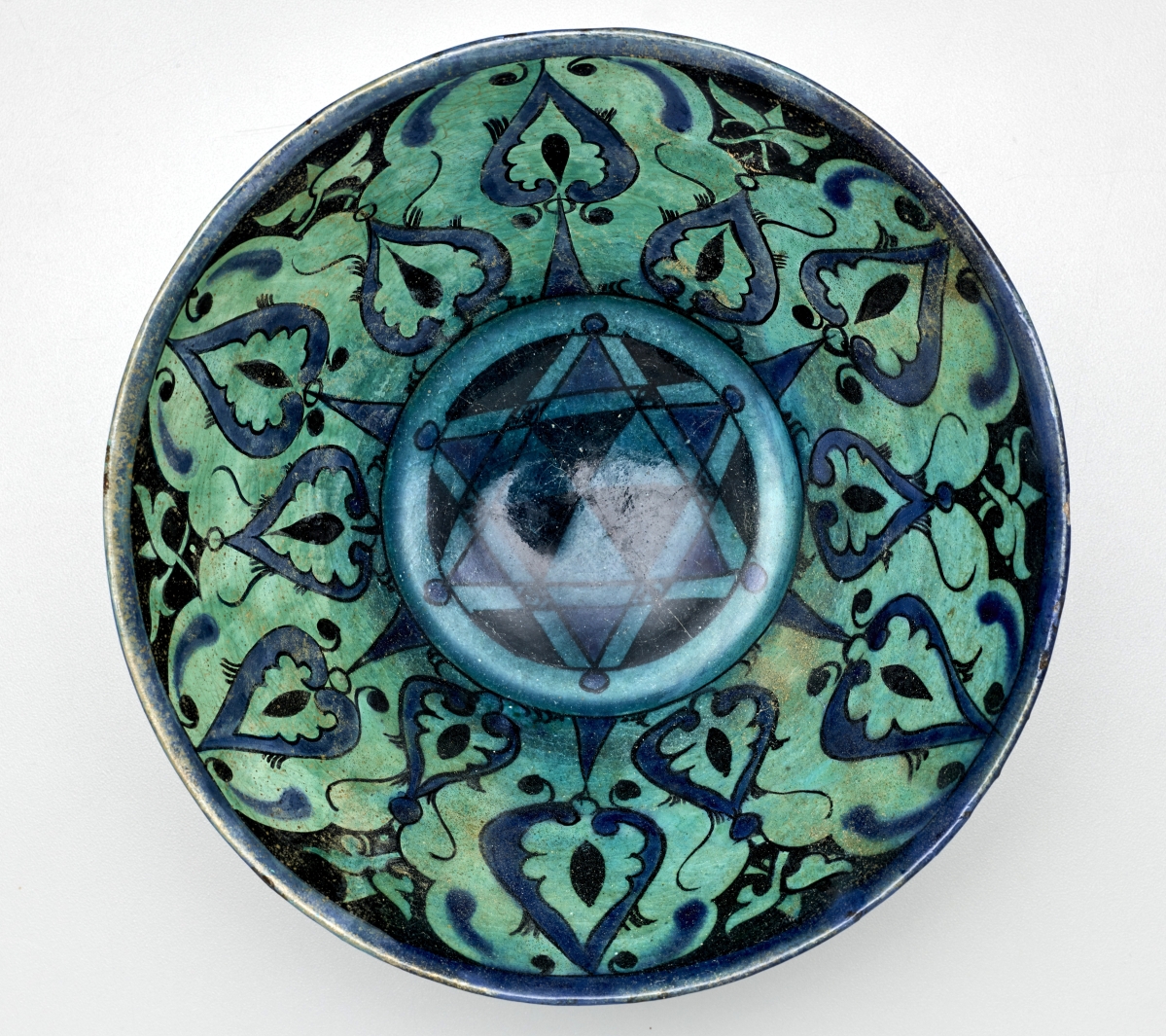 Bowl, Iran, Thirteenth Century, ceramic, overall 4-  by 9-  by 9-  inches.