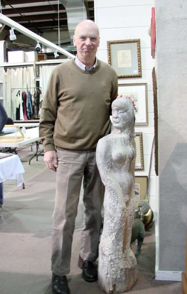 Hap Moore with the Robert Laurent sculpture of a nude woman.