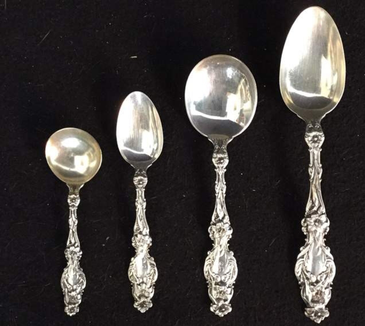 Some pieces from the sale’s top lot, a 127-piece Whiting Lily sterling flatware set from a Parisian estate, which sold for $6,350.
