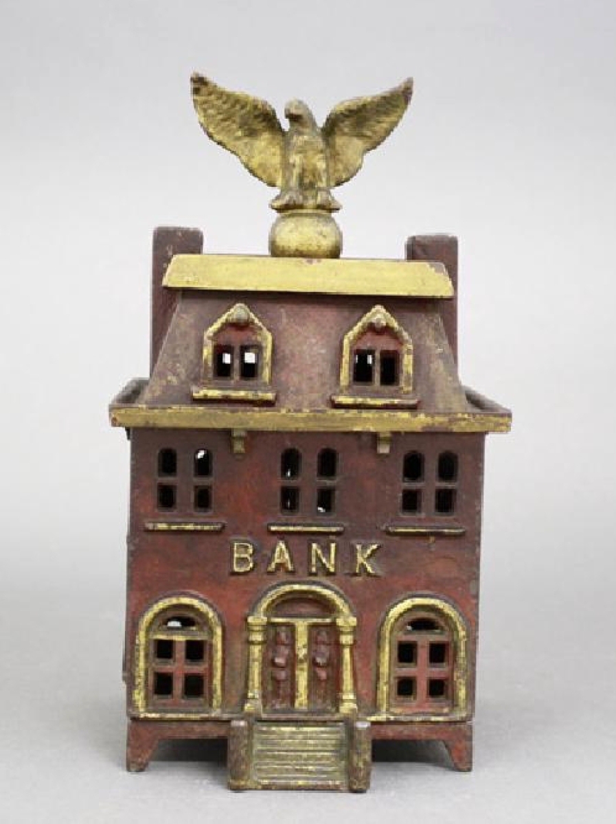 A good number of building banks came up toward the end of the auction, including Bank Building with Eagle Atop Orb, maker unknown, American, circa 1890. This bank is unusual in that it includes a third floor and is one of the finest specimens to ever be sold at auction. It is of cast iron, pristine-plus condition and brought $6,600, above the high estimate.
