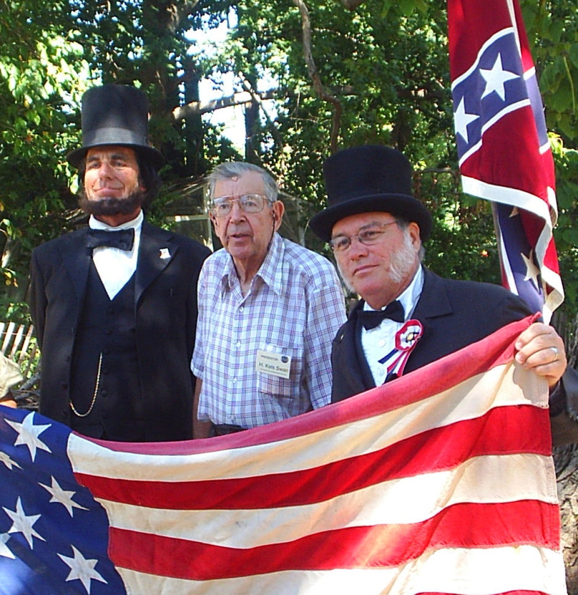 In this 2008 photo, Kels Swan stands between reenactors of President Abraham Lincoln and former New Jersey governor Charles Smith Olden.