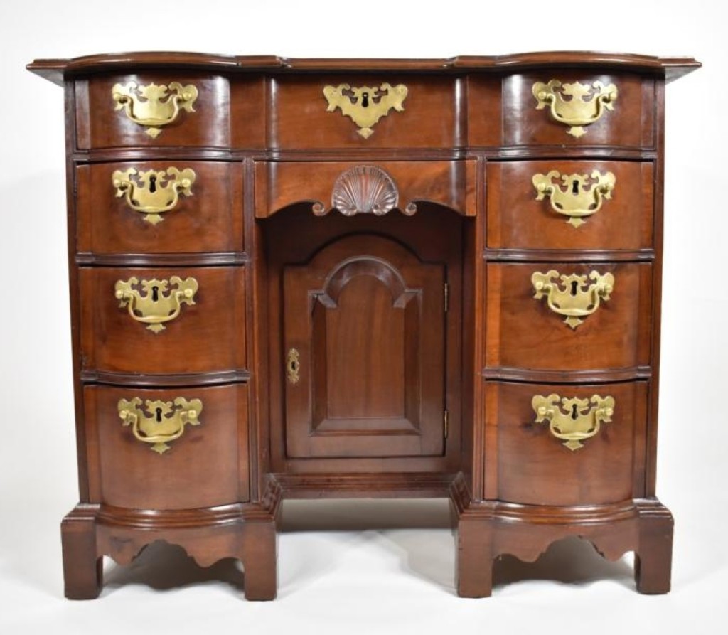 The highlight of the sale was this mahogany Queen Anne block front kneehole desk. An article in a 1984 Magazine Antiques pictured it and attributed it to Benjamin Frothingham. It was later sold by Wayne Pratt and had been in a Midwestern collection for more than a decade. It realized $23,000.