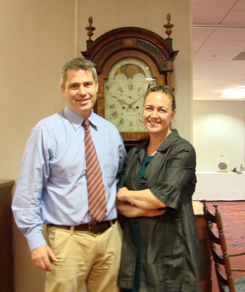 Jack O’Brien and his wife, Nancy, with the Aaron Willard tall case clock. It was the couple’s first auction.