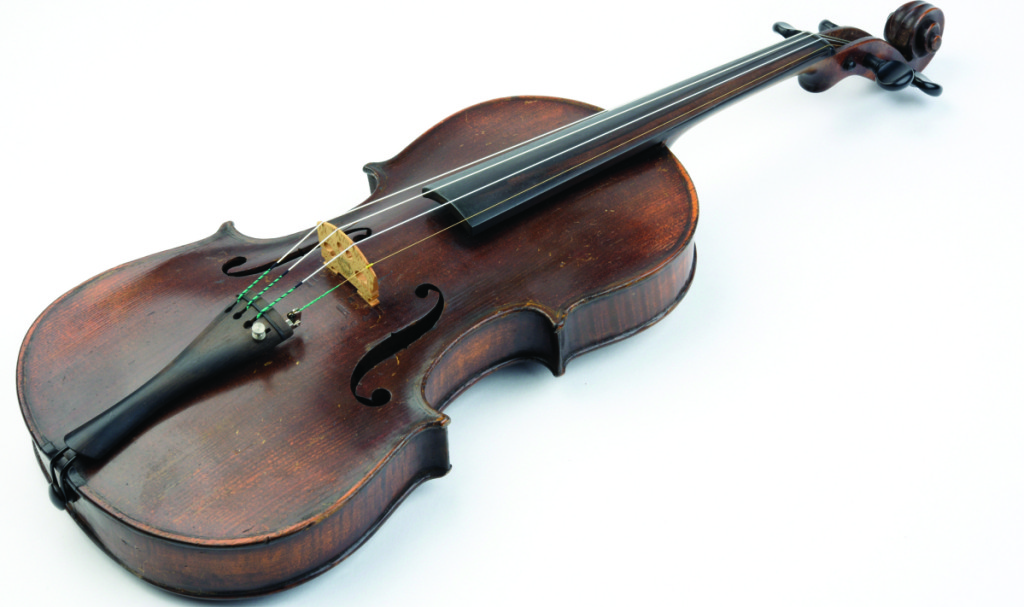 Violins by legendary makers realize enormous prices. The history of adding an impressive but  fake label to an ordinary old fiddle goes back to the Nineteenth Century. This violin from that era was trying to pass itself off as a Stradivarius. Visitors can listen to recordings that demonstrate the difference in sound quality between a real Strad and a less distinguished instrument.