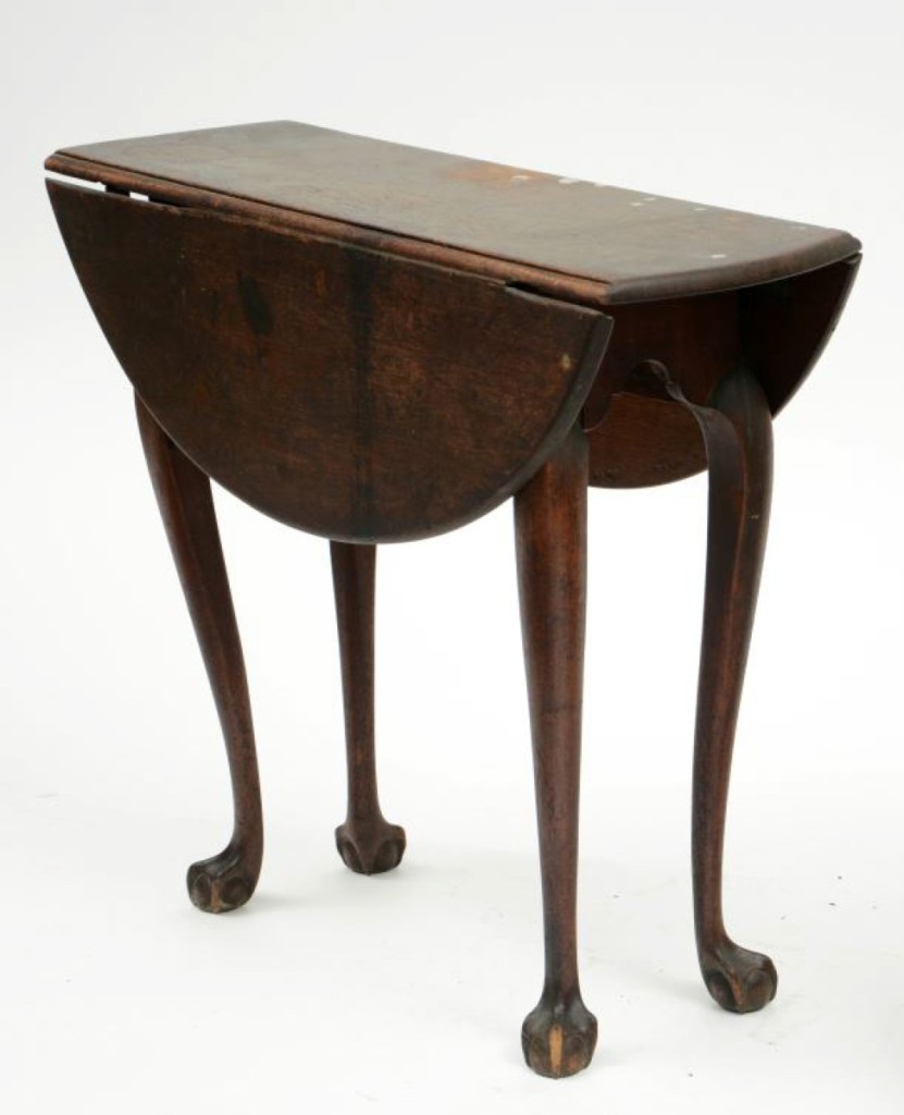Selling for $26,450, this small circa 1770–80 Chippendale walnut drop leaf tea table was the highest priced piece of furniture of the day. It had been in a Vermont attic for decades and was bought by dealer Stephen Score.