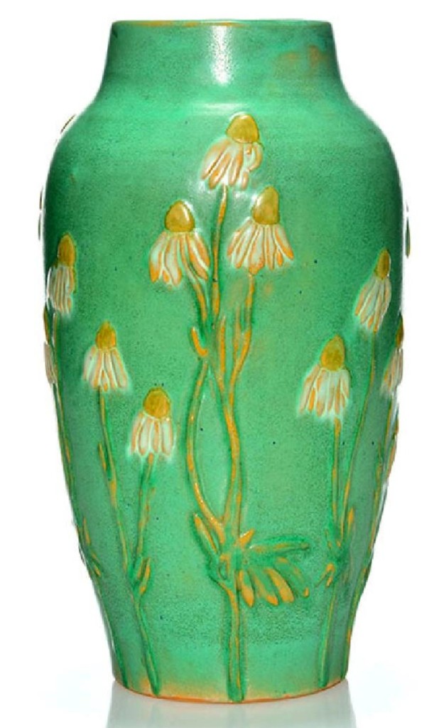 Riley Humler’s trip to the University of Iowa at Ames established further examples and a positive identification of this Iowa State vase to artist Ethel Julia Bouffleur. The mark on the bottom of the work had never been seen before. At her auction premiere, Bouffleur’s vase tied for top lot in the sale, bringing $24,200.
