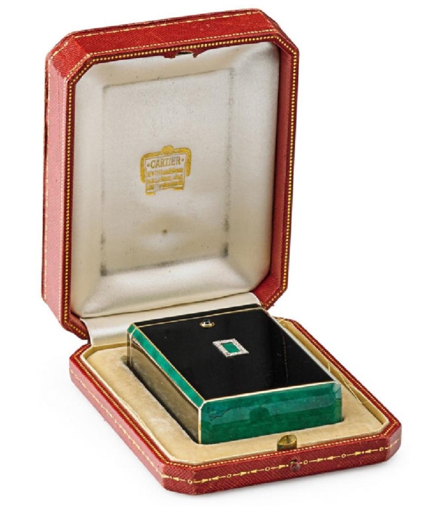 In its original box, this Cartier enameled gold cigarette case was fit for someone with a good sense of style. It brought $9,375.