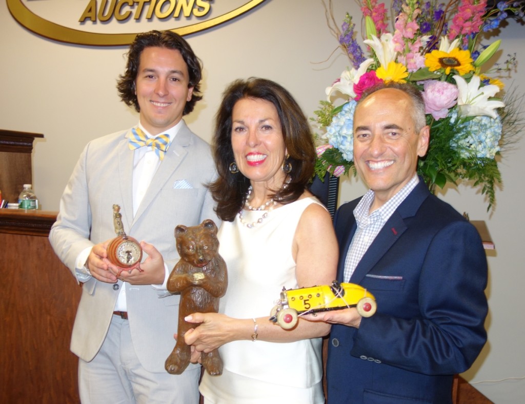 Jeanne Bertoia, flanked by her two auctioneers, Tim Luke, at right, who has been with the Bertoia firm for close to 20 years, and Michael Bertoia, Jeanne’s son, who is involved in every aspect of the company.