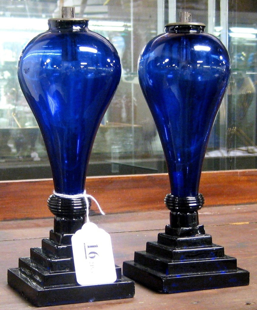 The top lot of the sale was a pair of deep purple-blue free-blown and pressed whale oil stand lamps from the Boston and Sandwich Glass Company, circa 1830. The lamps sailed past their $3/5,000 estimate to bring $26,910. Kaiser collection.