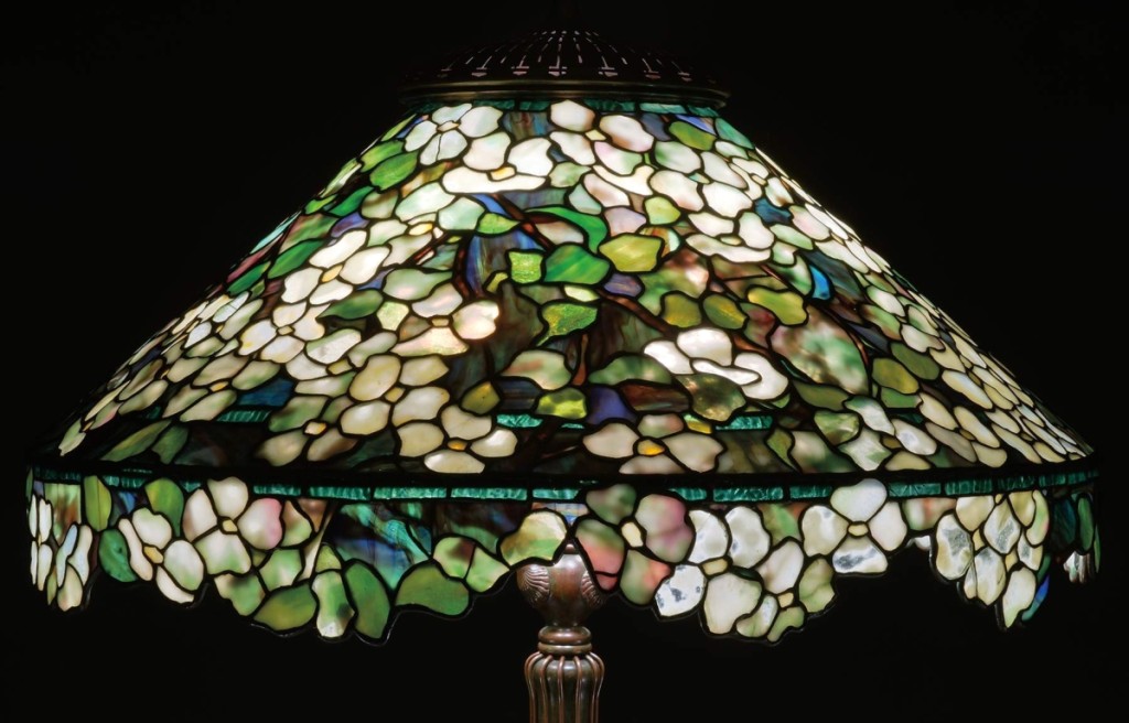 This rare Tiffany Studios floor lamp with all over dogwood design and an unusual irregular floral lower border led the day, blowing through its estimate of $100/150,000 to reach $406,600.