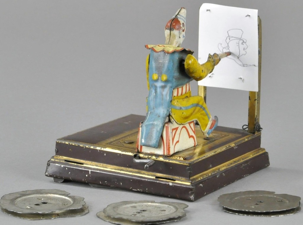 One of the popular toys in the auction was the Vielmetter Clown Artist, Germany, a very rare mechanical toy made by Phillip Vielmetter Mechanische Werkstätten, Berlin, 1885. This toy as made only as a gift to the best customers and it was the most complicated toy in the 1800s. It features a tin lithographed clown sitting at an easel sketching a picture via a crank-operated mechanism. He can draw different designs controlled by a double cam. The toy measures 5 by 4 inches, excellent condition, had a high estimate of $2,400, and sold for $6,600.