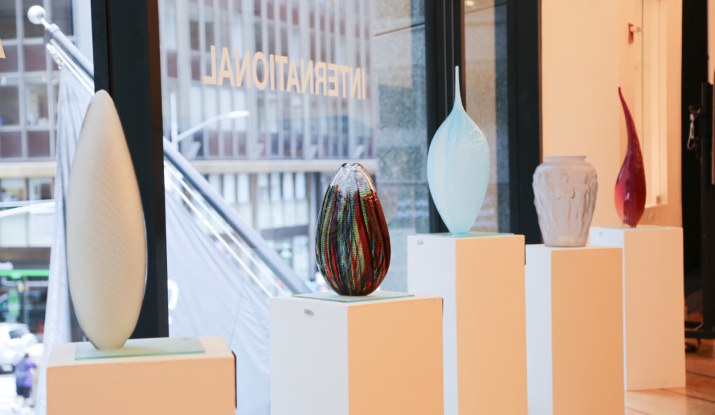 Tagliapietra and René Lalique were among the highest grossing glass artists in the sale. Here a selection of their works stands in a row in the bidding room.