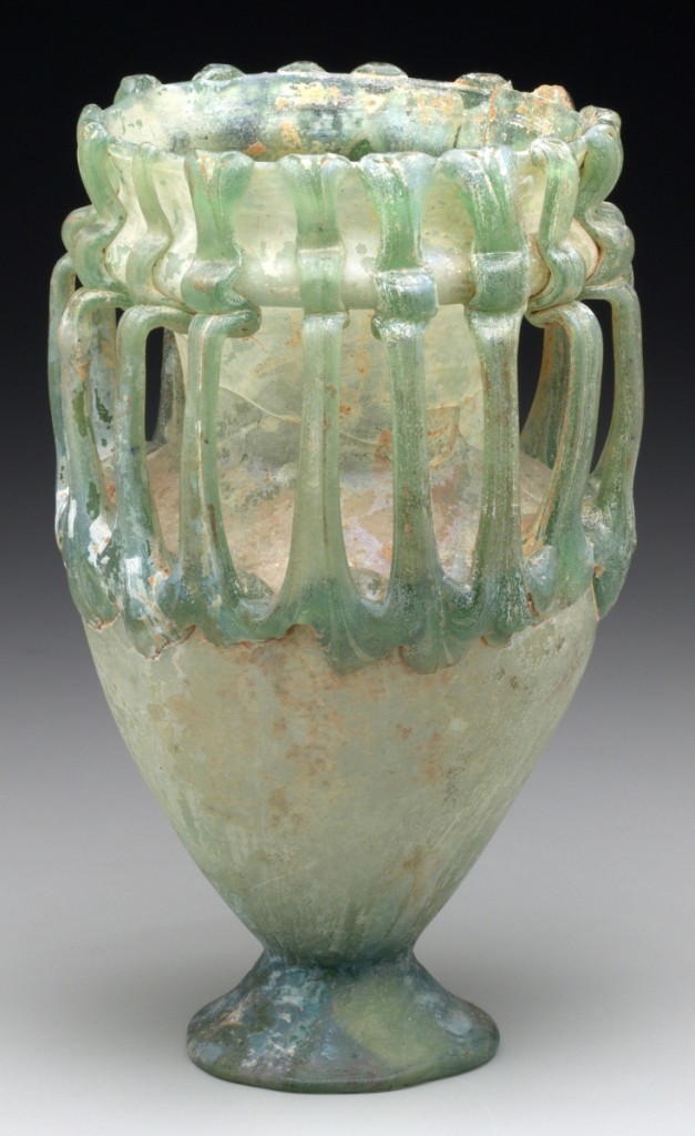 Jar with 16 handles, Roman, Eastern Mediterranean, Fourth–Fifth Century CE, free-blown glass with trailed handles, 6-9/16 by 3- inches. Yale University Art Gallery, the Anna Rosalie Mansfield Collection.