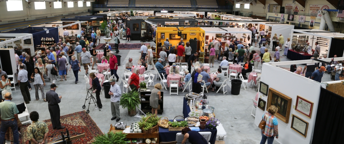 The aisles were full for the opening of the show, with people enjoying a bite to eat at the cafe in back and browsing through the booths on all sides.