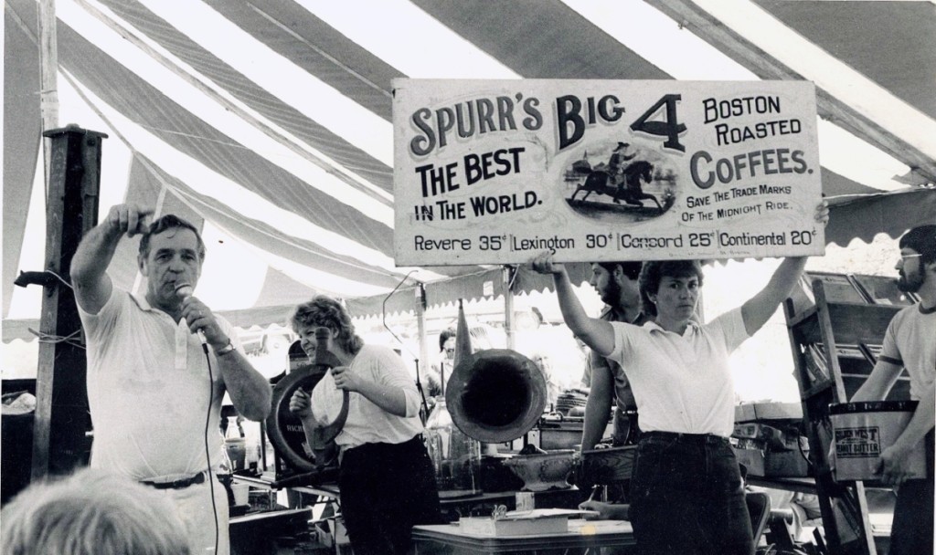 This 1984 photograph shows Arthur, left, in high form at a country auction in Palermo, Maine, dispersing contents of an old country store. He was assisting his daughter and her husband, Jeannine and Steve Poulin, as they began their auctioning career. He continued to do so until his death.