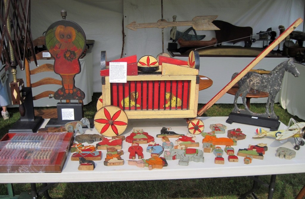 Holden’s Antiques, Sherman, Conn., showing their toy collection at Heart-O-The-Mart.