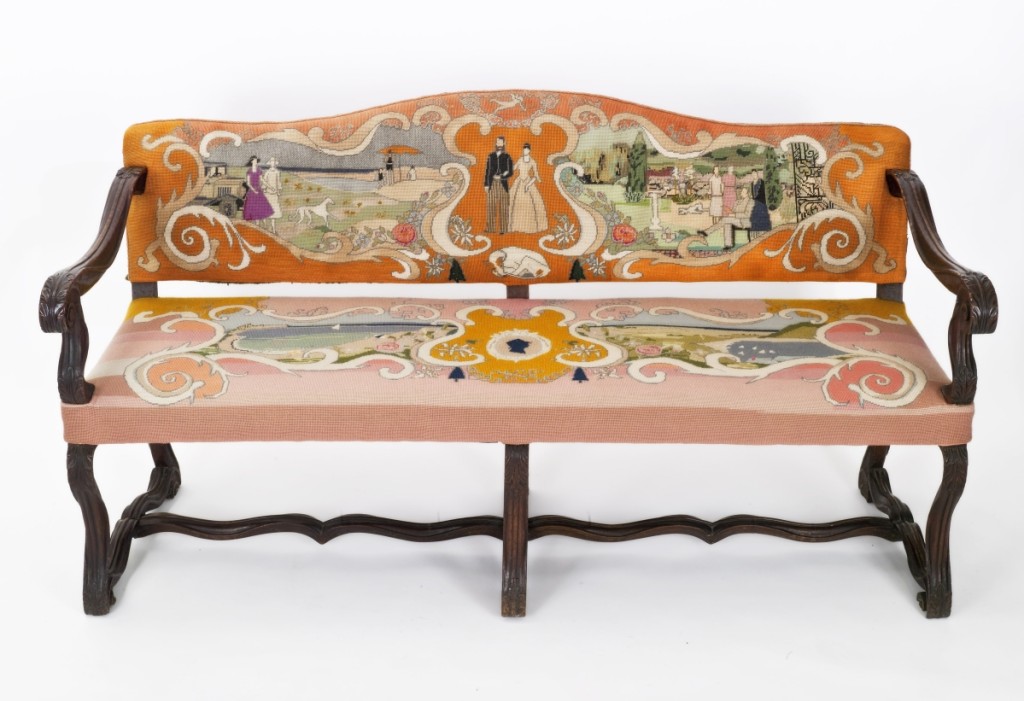 Italian carved sofa with needlepoint upholstery depicting scenes of summer on Nantucket, designed by the Monaghan sisters and stitched by their mother in about 1930.