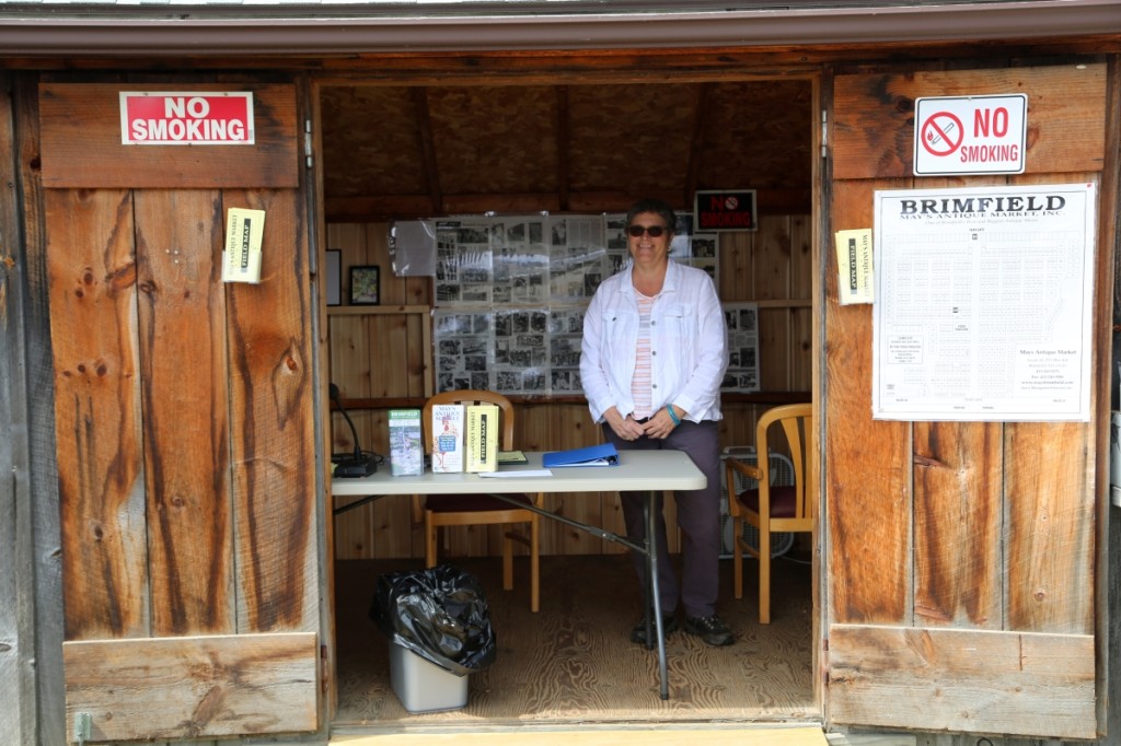 Martha May, show manager, in her element, inside of her office and one of the few short moments where there wasn’t an attendee in front of her with a question. —May’s Antique Market